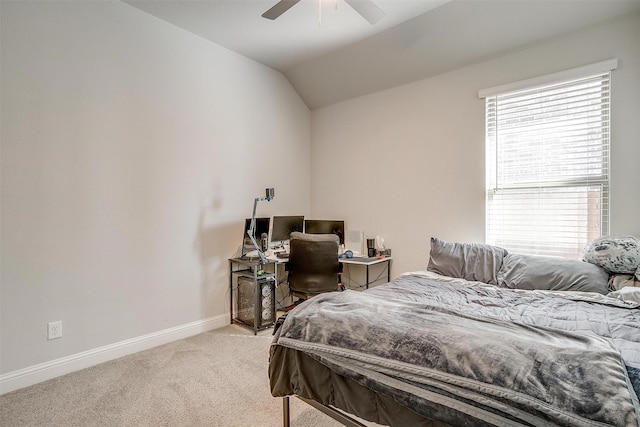 bedroom featuring lofted ceiling, carpet floors, and ceiling fan