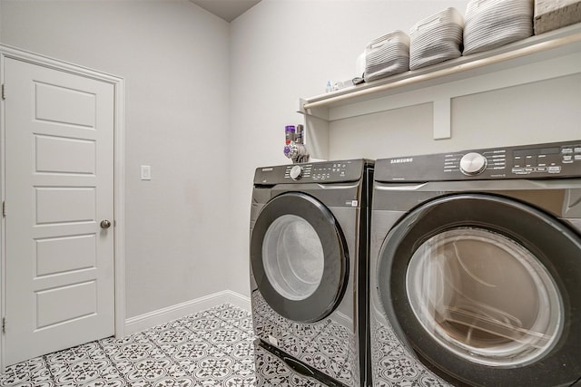 laundry room featuring light tile patterned floors and independent washer and dryer