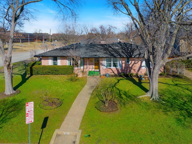 single story home with a front yard