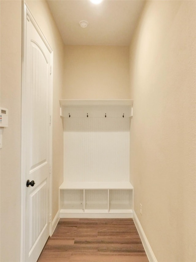 mudroom with hardwood / wood-style flooring