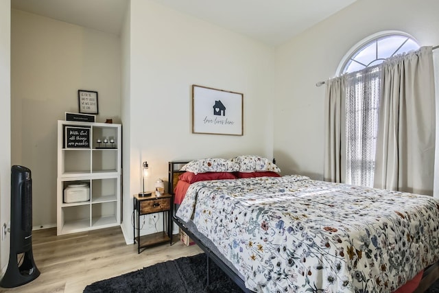 bedroom featuring hardwood / wood-style floors