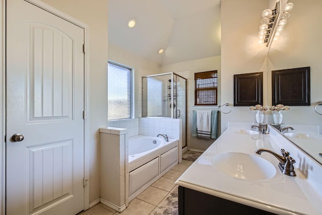 bathroom featuring vanity, tile patterned floors, and shower with separate bathtub