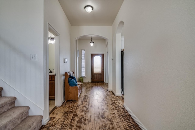 entryway featuring dark wood-type flooring