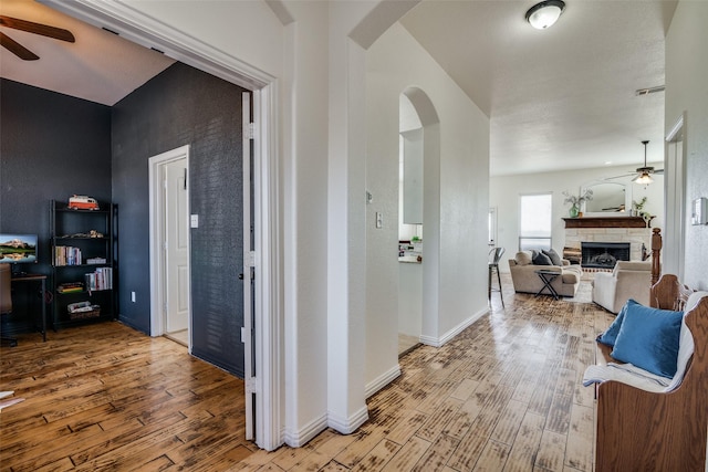 hallway with wood-type flooring