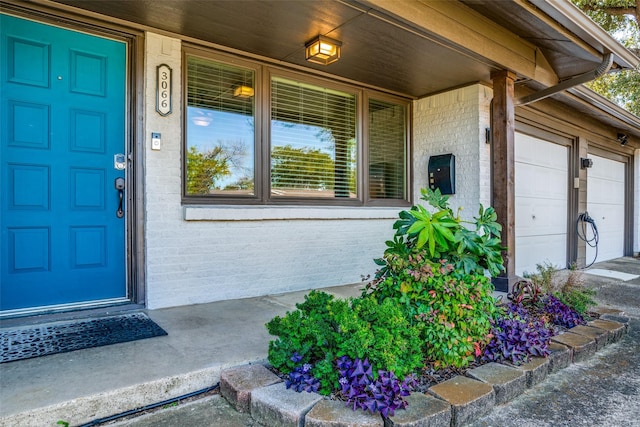 entrance to property featuring a garage