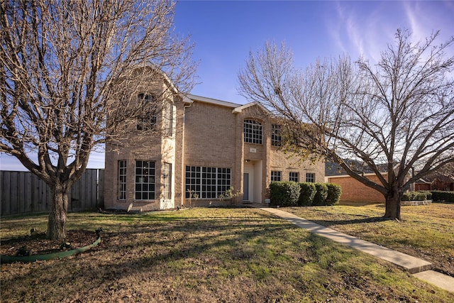 view of front of home featuring a front lawn