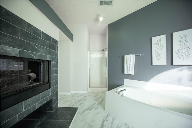 bathroom with a textured ceiling and plus walk in shower