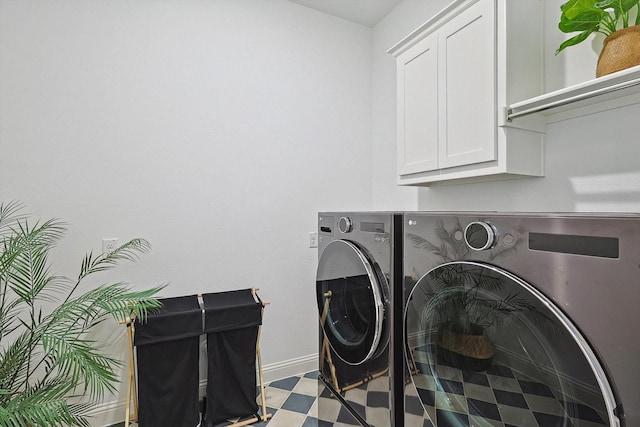 laundry room with separate washer and dryer