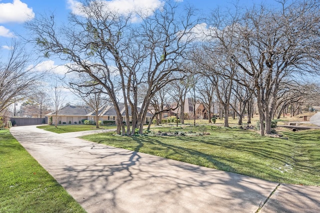 view of community with a lawn