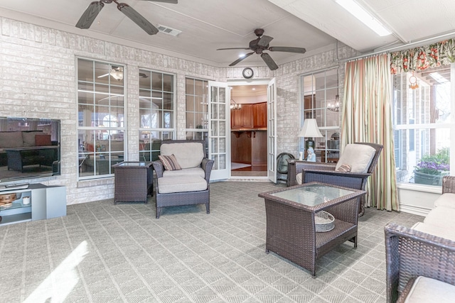 view of patio / terrace with a ceiling fan and visible vents