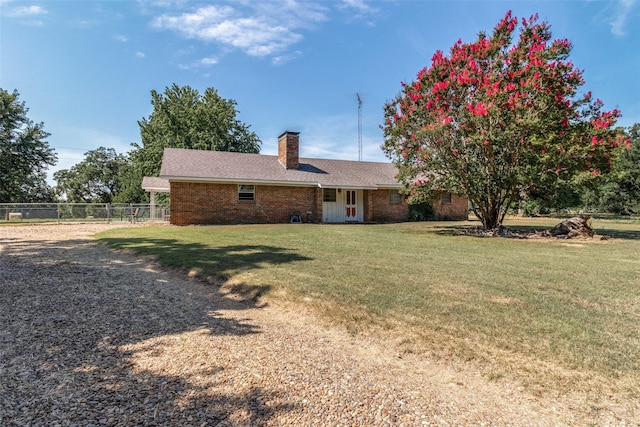 exterior space with a lawn