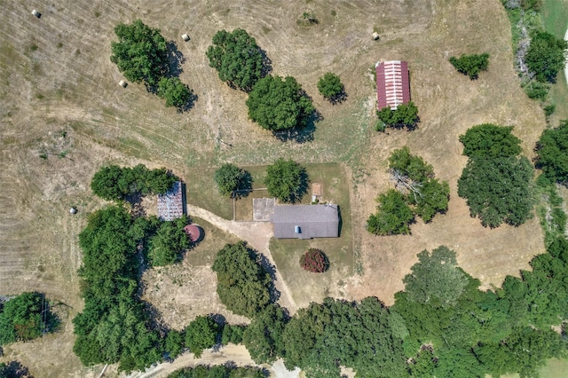 birds eye view of property with a rural view