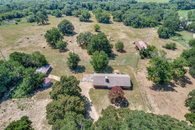 birds eye view of property featuring a rural view