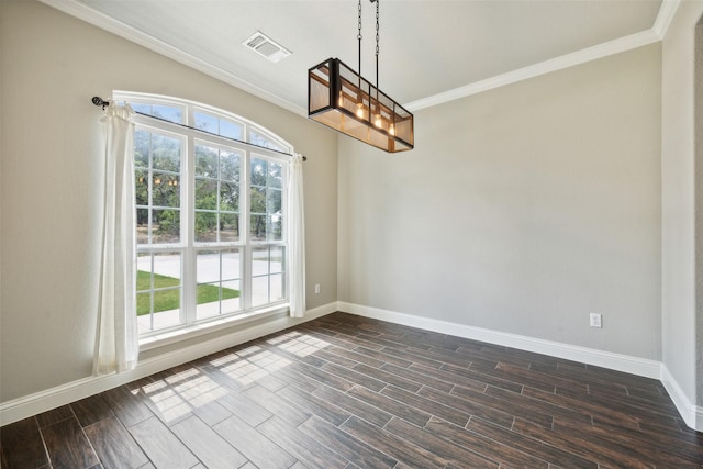 unfurnished dining area with crown molding and a notable chandelier