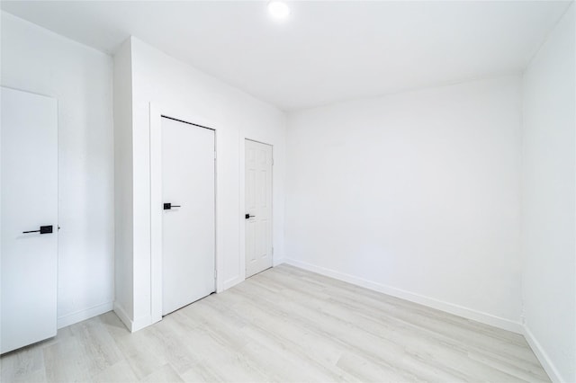 unfurnished bedroom featuring light hardwood / wood-style floors