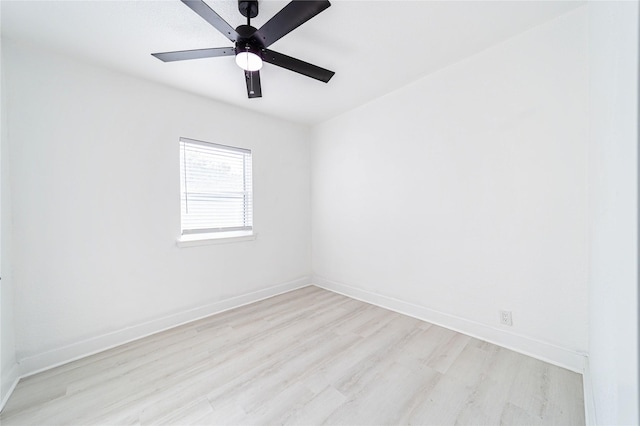 empty room with ceiling fan and light wood-type flooring