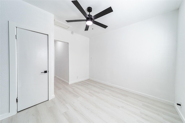 unfurnished bedroom with ceiling fan and light hardwood / wood-style flooring