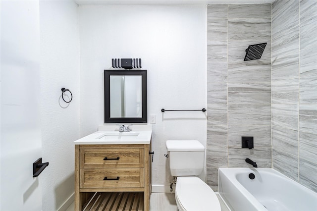 full bathroom with tiled shower / bath combo, vanity, and toilet