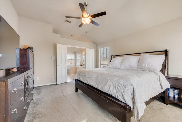 carpeted bedroom with lofted ceiling and ceiling fan