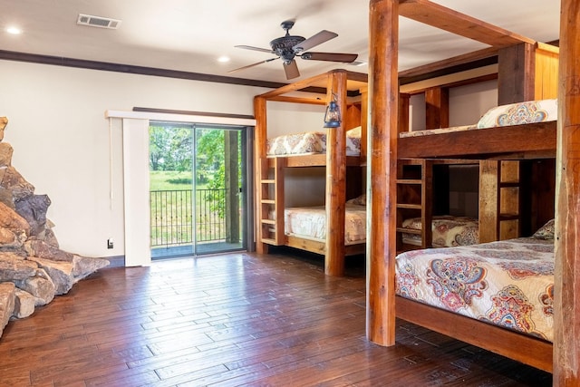 bedroom with dark hardwood / wood-style flooring, ceiling fan, crown molding, and access to exterior