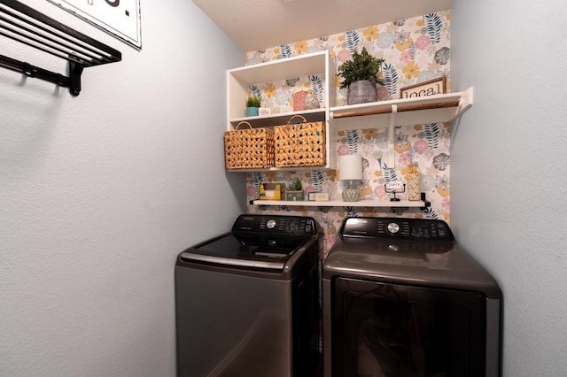 washroom with washing machine and dryer