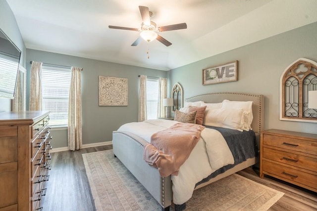 bedroom featuring ceiling fan and light hardwood / wood-style flooring