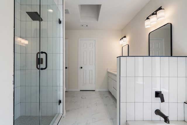 bathroom featuring walk in shower and vanity