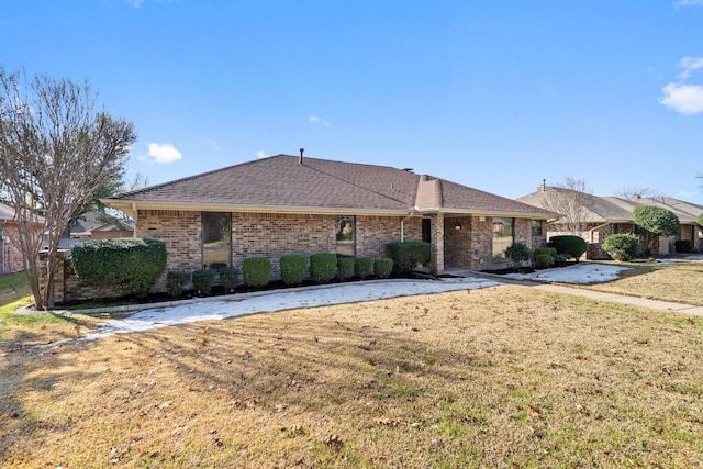 ranch-style house with a front yard