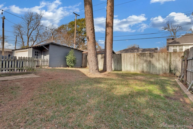 view of yard featuring a garage