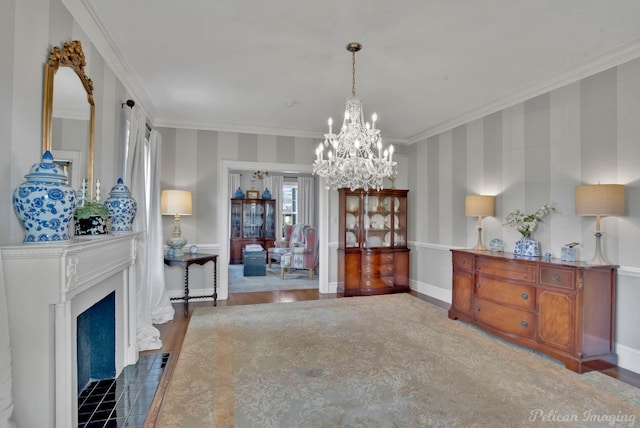 interior space with a chandelier, ornamental molding, and wood-type flooring