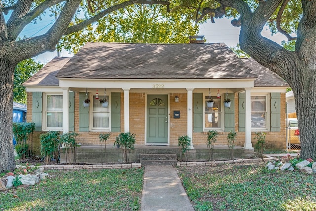 bungalow-style home with a porch