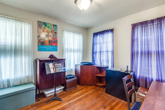 office area with hardwood / wood-style flooring