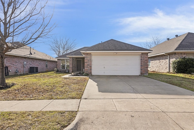 ranch-style house with a front lawn, cooling unit, and a garage