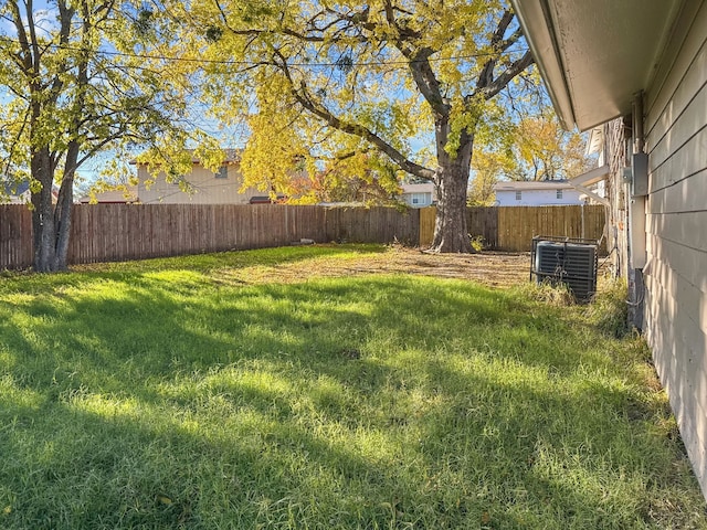 view of yard featuring central AC