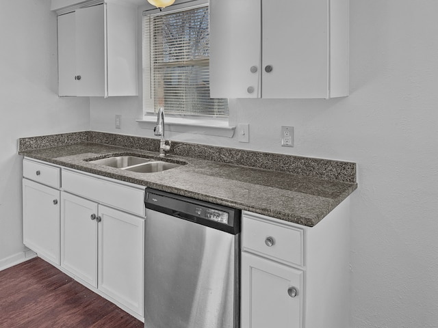 kitchen with white cabinets, dishwasher, dark hardwood / wood-style flooring, and sink