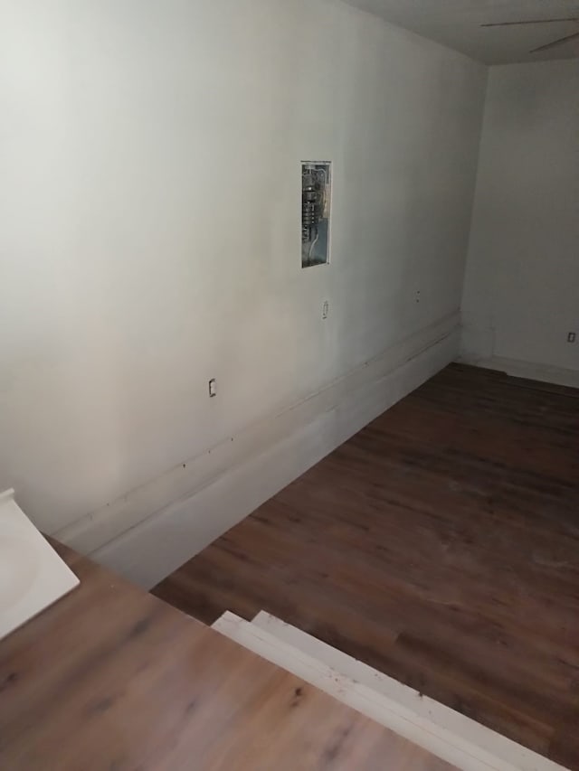 spare room featuring dark hardwood / wood-style floors