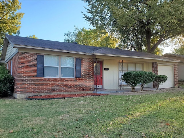 ranch-style home with a front yard and a garage