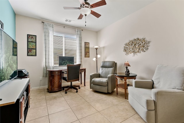 office space with ceiling fan and light tile patterned floors