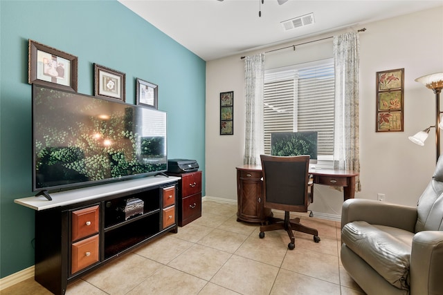 office with ceiling fan, light tile patterned floors, and plenty of natural light