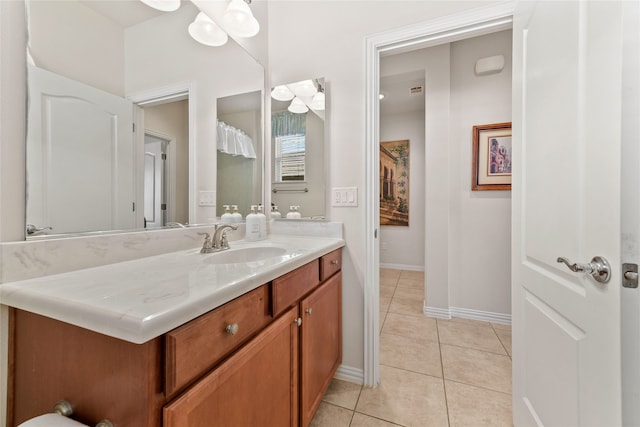 bathroom featuring tile patterned floors and vanity