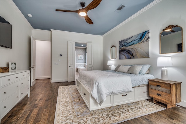 bedroom with connected bathroom, ceiling fan, crown molding, and dark wood-type flooring