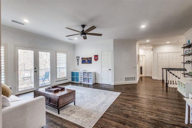 living room featuring ceiling fan, french doors, crown molding, and dark hardwood / wood-style flooring