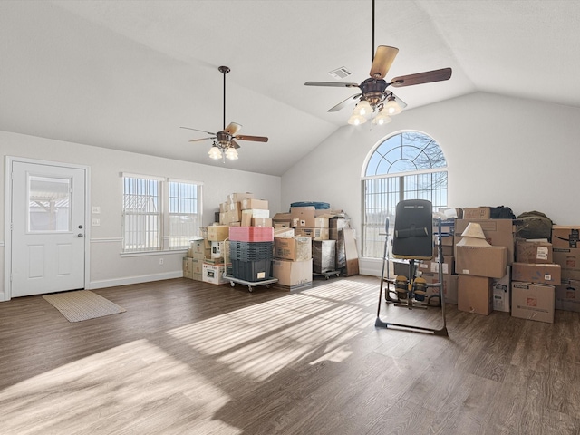 interior space with wood-type flooring, lofted ceiling, and ceiling fan