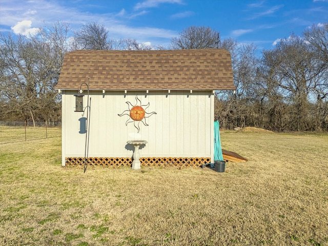 view of outdoor structure with a yard