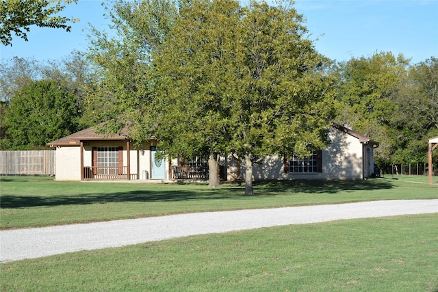 view of front of house with a front lawn