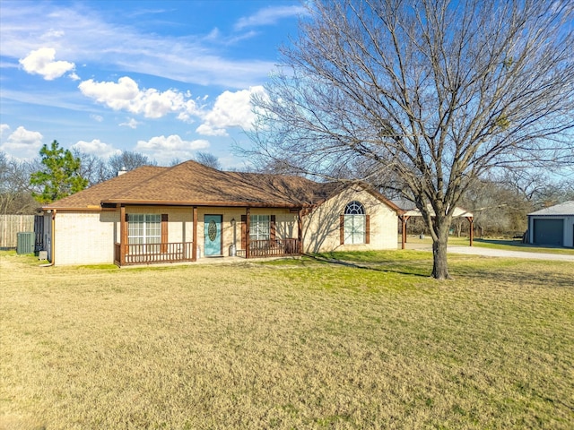 ranch-style house featuring a front yard and a porch