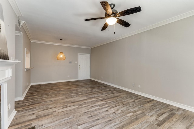 unfurnished living room with ceiling fan, ornamental molding, and wood-type flooring