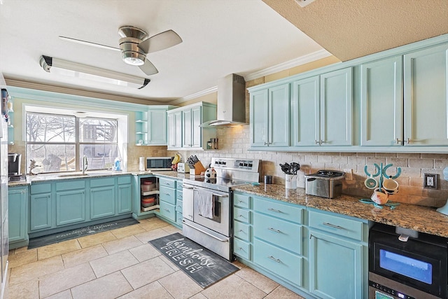 kitchen featuring stainless steel appliances, light tile patterned flooring, wall chimney range hood, ornamental molding, and sink