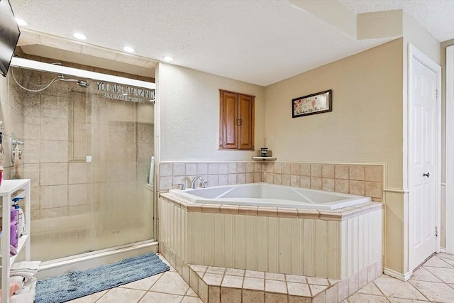 bathroom featuring a textured ceiling, tile patterned floors, and plus walk in shower