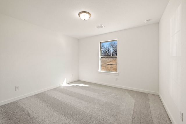 unfurnished room with carpet